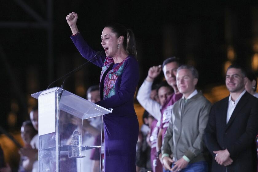 Ruling party presidential candidate Claudia Sheinbaum addresses supporters at the Zocalo, Mexico City's main square, after the National Electoral Institute announced she held an irreversible lead in the election, early Monday, June 3, 2024. (AP Photo/Marco Ugarte)