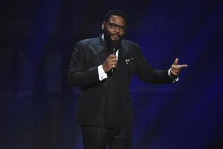 Host Anthony Anderson speaks on stage at the 51st NAACP Image Awards at the Pasadena Civic Auditorium on Saturday, Feb. 22, 2020, in Pasadena, Calif. (AP Photo/Chris Pizzello)