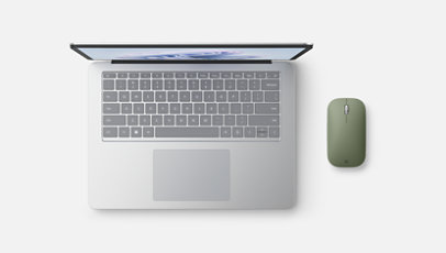 A Surface Laptop Studio 2 and a Microsoft Modern Mobile Mouse.