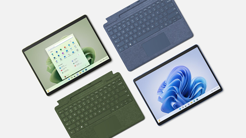 Un Surface Pro 9 con cover con tasti nei colori Foresta e Sapphire.