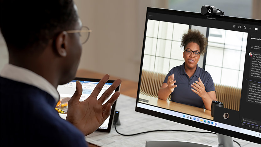 A man on a Teams video call with a Microsoft Product Expert.