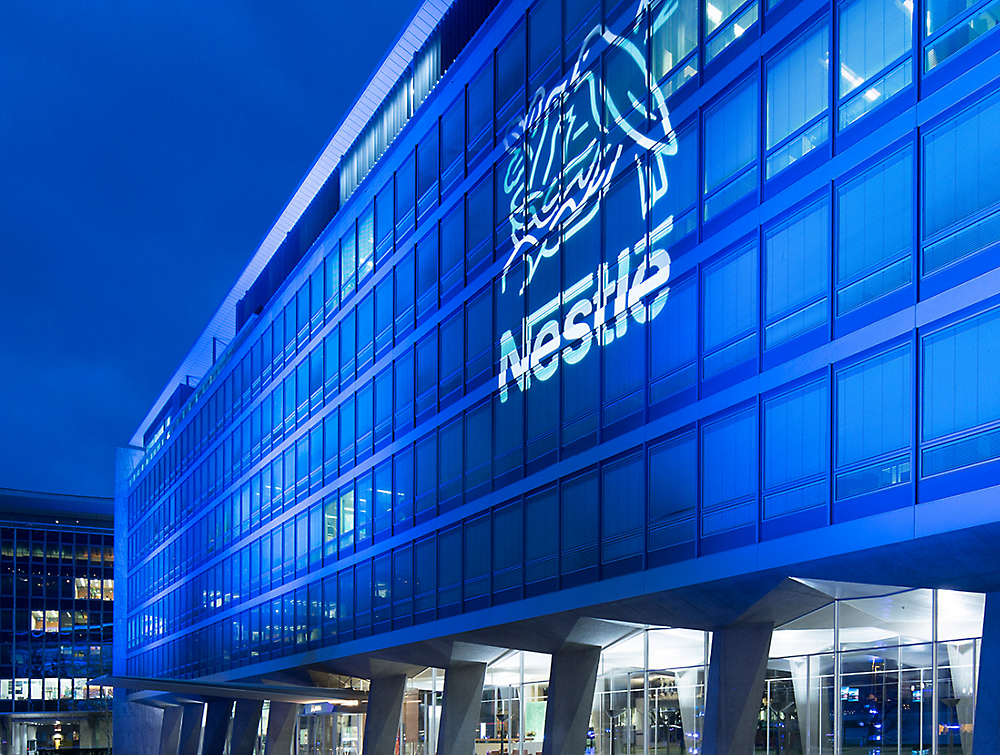 A building with a Nestle logo on the side