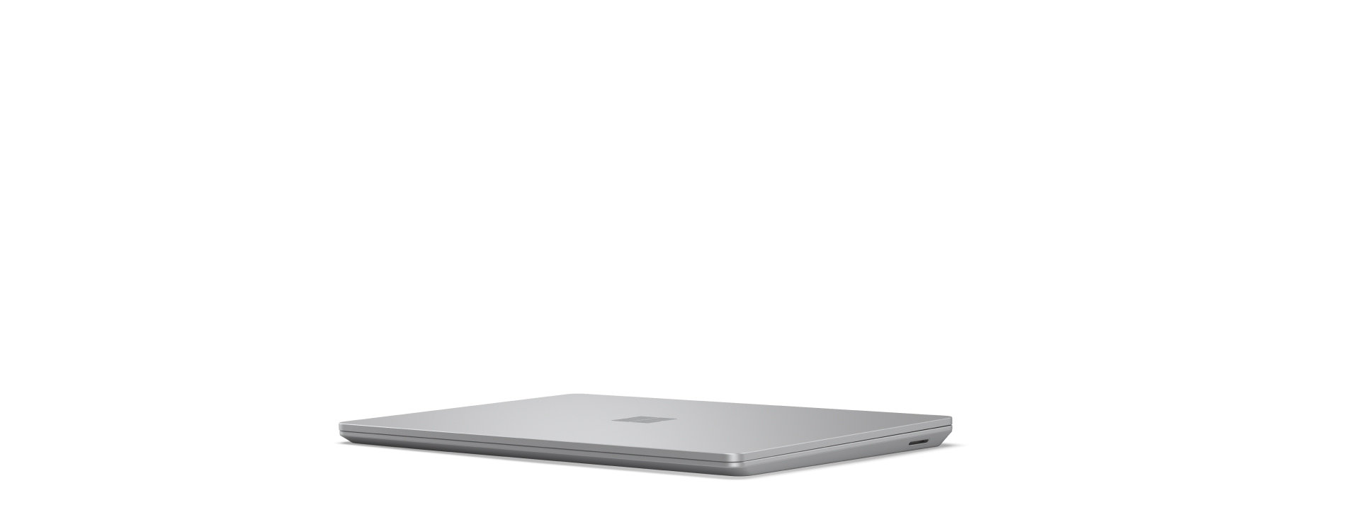 Fotograma inicial para un dispositivo Surface Laptop Go 3 rotando, que se abre y cierra mientras se muestran todos sus ángulos.