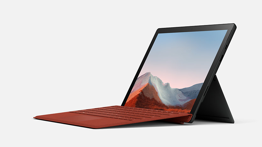 Surface Laptop 7 with Poppy Red Type Cover.