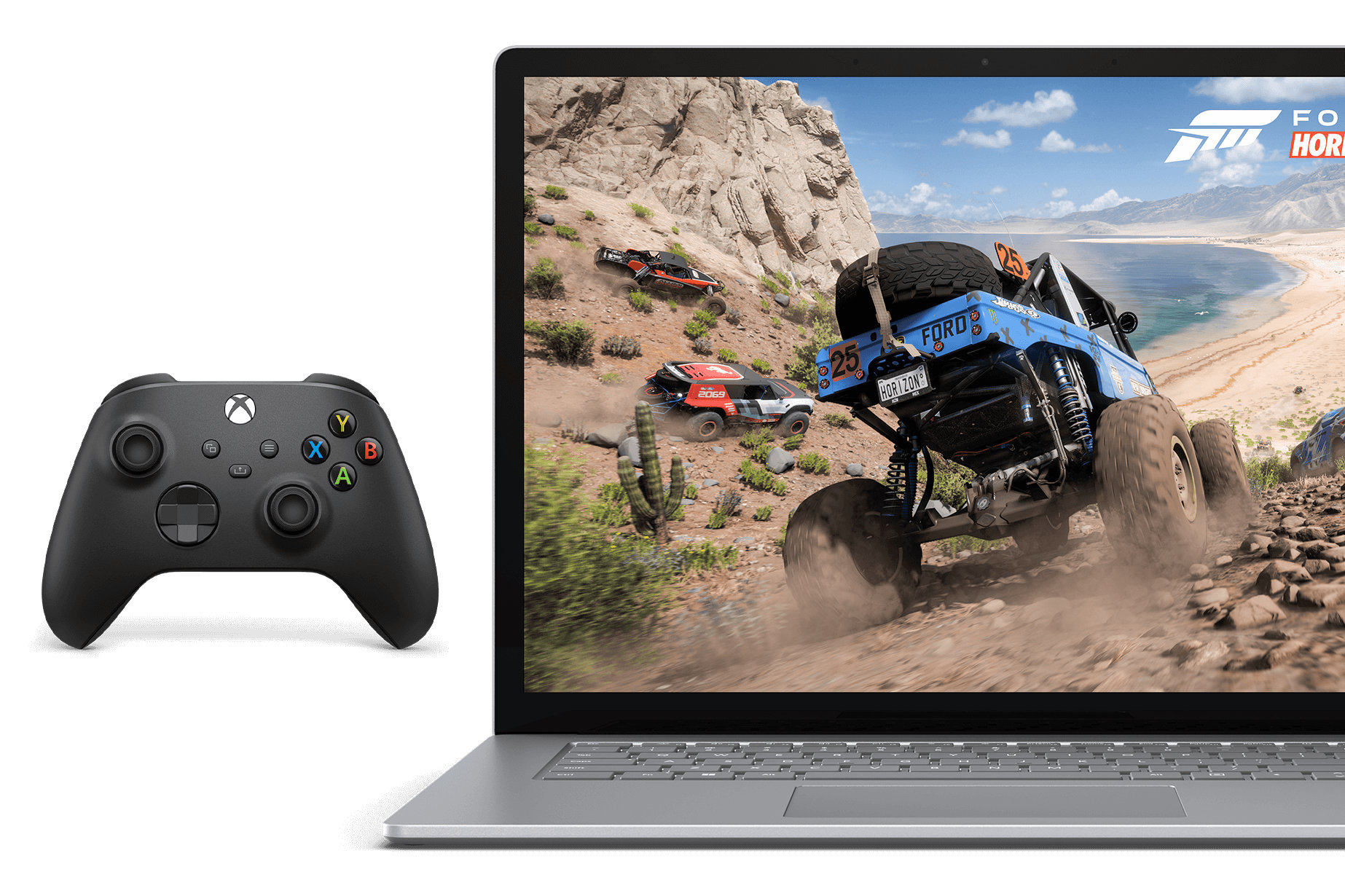 Vue de face du Surface Laptop 5 avec un jeu vidéo d’un monster truck, une manette Xbox à proximité.