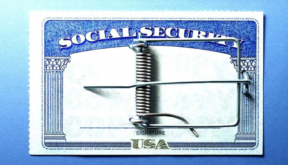 a social security card with a mousetrap on it