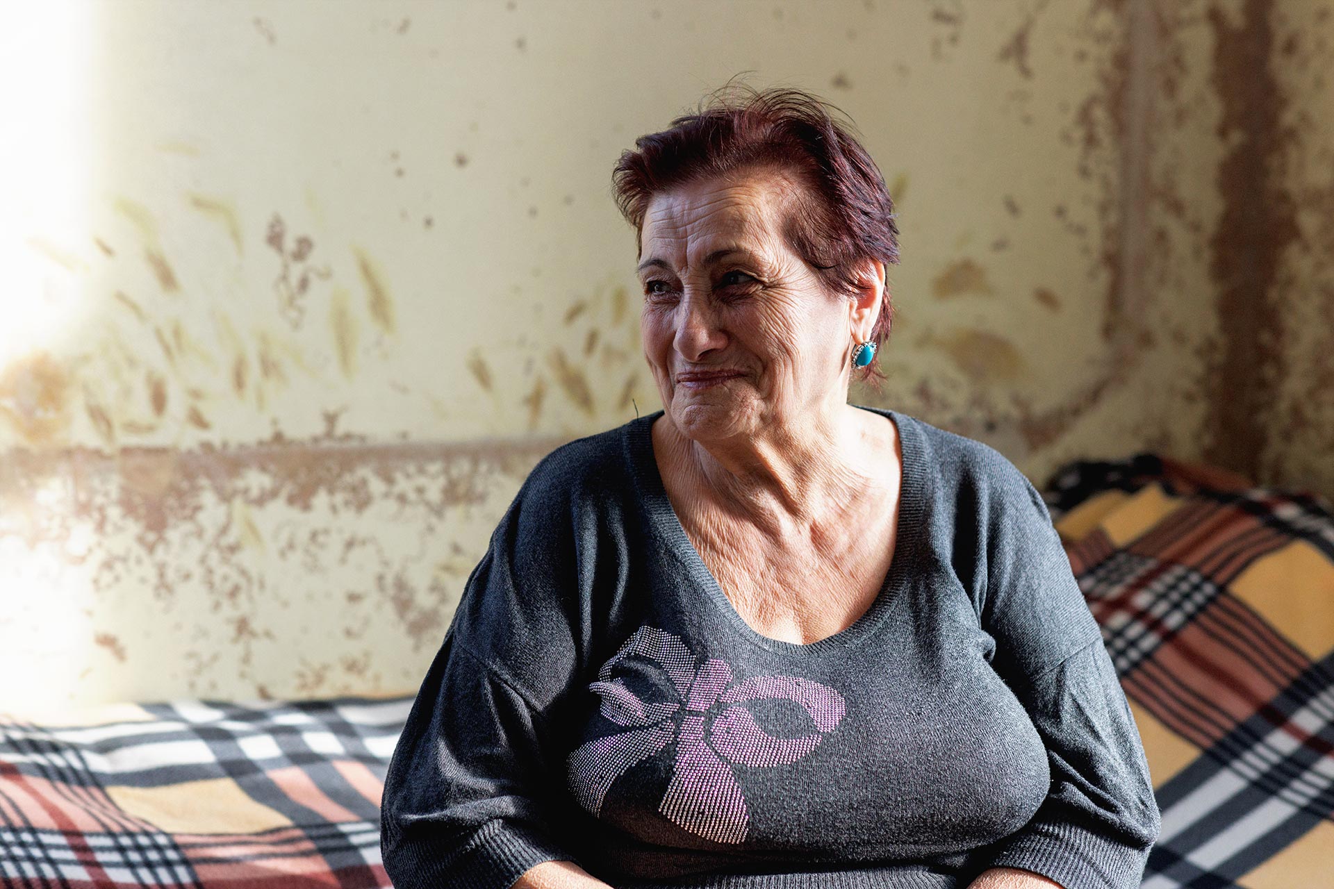 Nella Movsisyan, 75, a refugee from the Karabakh region living in a refugee shelter.
