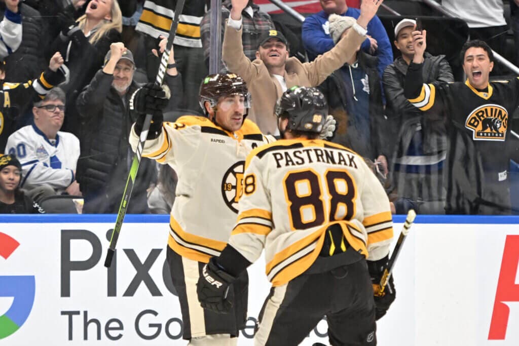 Bruins' David Pastrnak does it all, Brad Marchand scores and an enforcer's salary