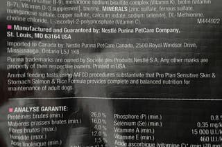 A disclaimer on the back of dog food indicating there was feeding trials.