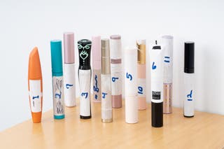 Different mascaras with numbers taped on.