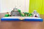 A lego set with mini versions of places from The Princess Bride side-by-side, forming a skyline.