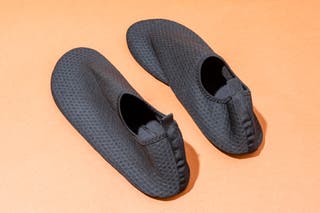The DigiHero Water Shoes, our pick for the best cheap knit water shoes, in pure black.