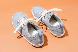 The Astral Loyak Water Shoes, one of our picks for the best water shoes, in light gray with white laces.