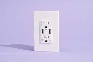 The Top Greener In-wall Smart Wi-Fi USB Charging Outlet sits on a purple backdrop.