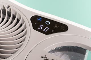 Close-up view of the display and control buttons on the top of the Vornado EVDC300.