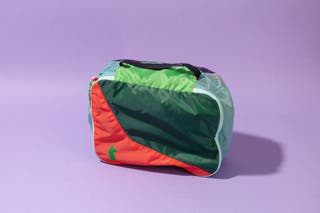 The Cotopaxi Cubos 10L Travel Cube, our pick for a brightly colored, upcycled, single packing cube.