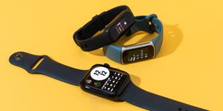 Our three picks for best fitness tracker shown next to each other in front of a yellow background.