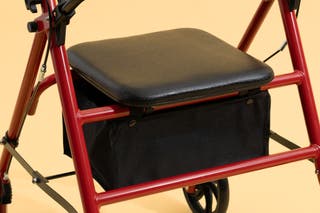 A close-up of the padded seat and storage pouch underneath on the Drive Durable Four Wheel Rollator.