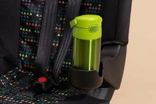The cup holder of the Finale 2-in-1 holding a travel mug.