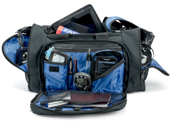 flight bag filled with pilot accessories