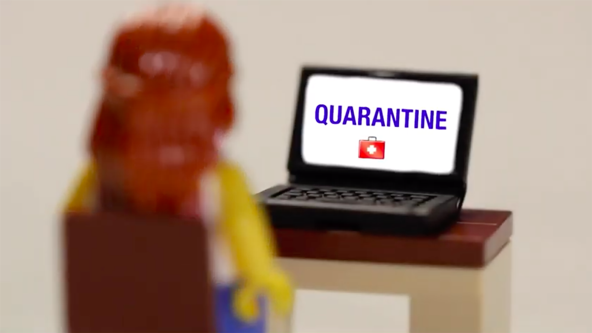 Lego person watching TV during the COVID-19 quarantine