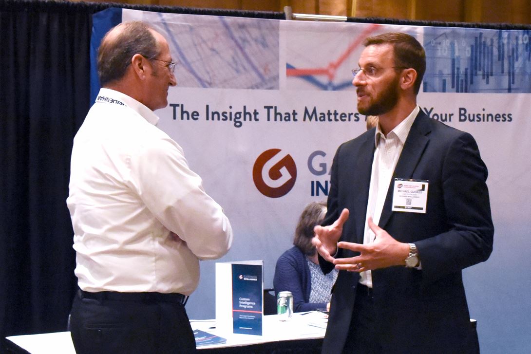 Gardner Business Media Chief Economist Michael Guckes (right)