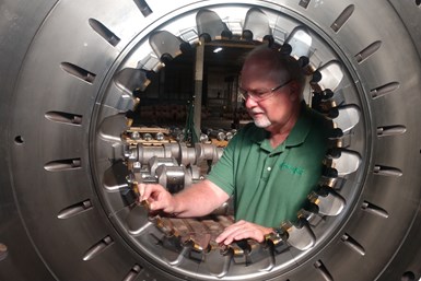 A photo of Greenleaf Sales and Service Engineer Denny Carpenter inspecting OCCO's American GFM FKP45 system 