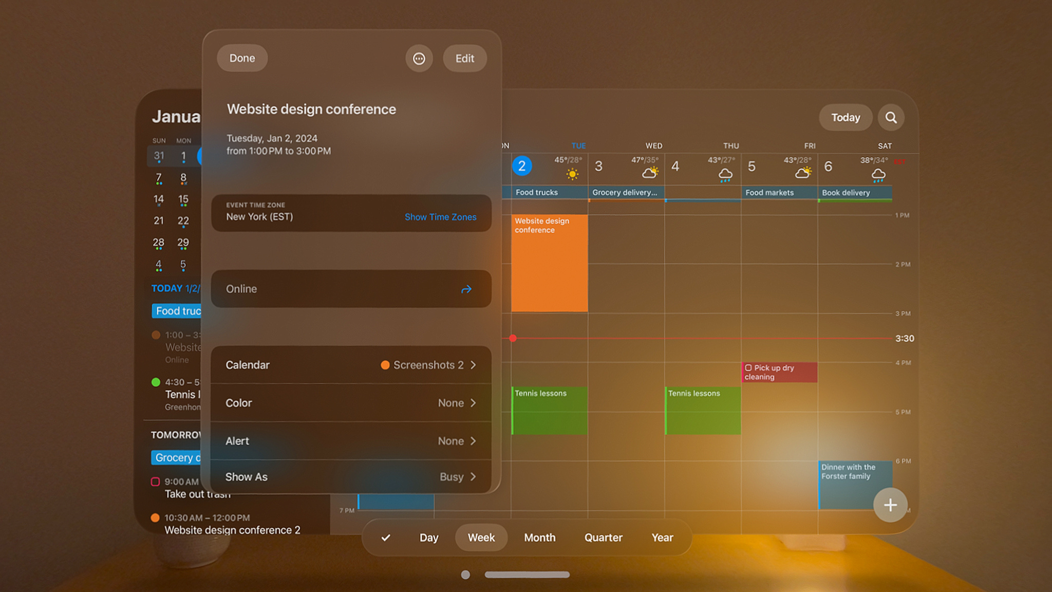 A monthly calendar appears in a low-lit room on Fantastical.