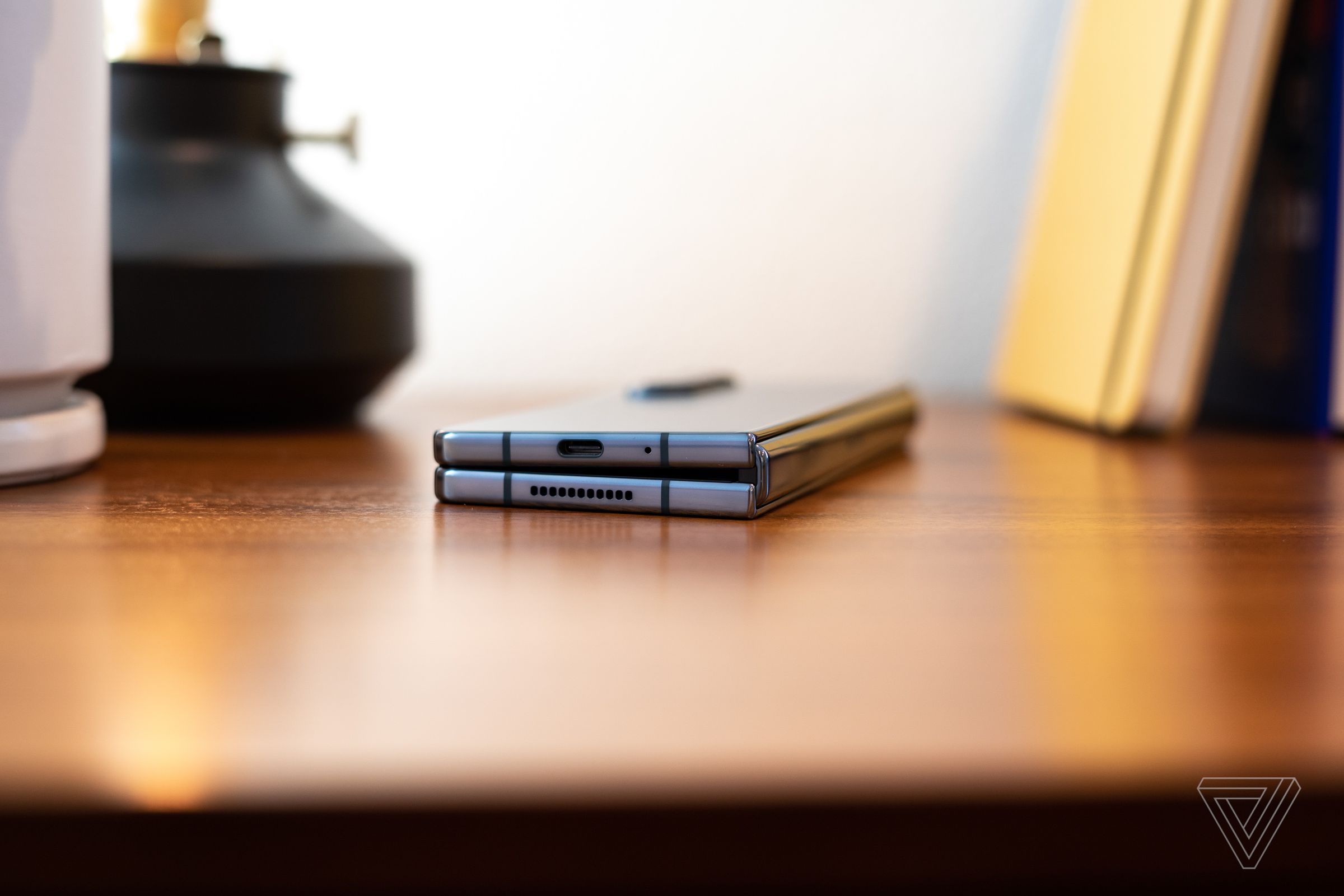 A closed Samsung Galaxy Z Fold 4 phone on a desk.