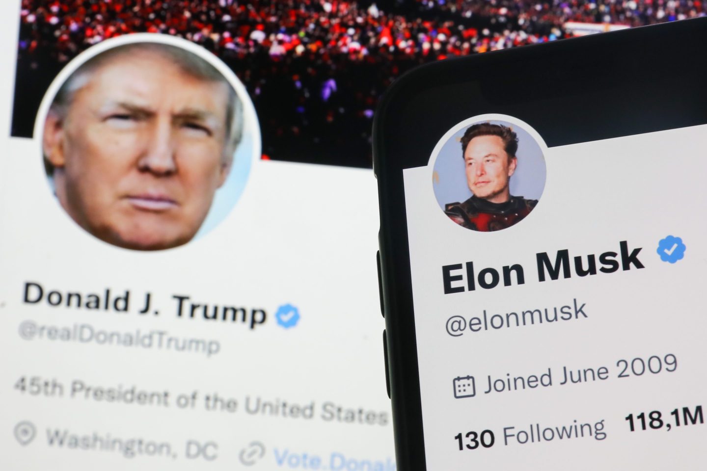 Donald Trump Twitter account displayed on a laptop screen and Elon Musk Twitter account displayed on a phone screen are seen in this illustration photo taken in Krakow, Poland on November 22, 2022. (Photo by Jakub Porzycki/NurPhoto via Getty Images)