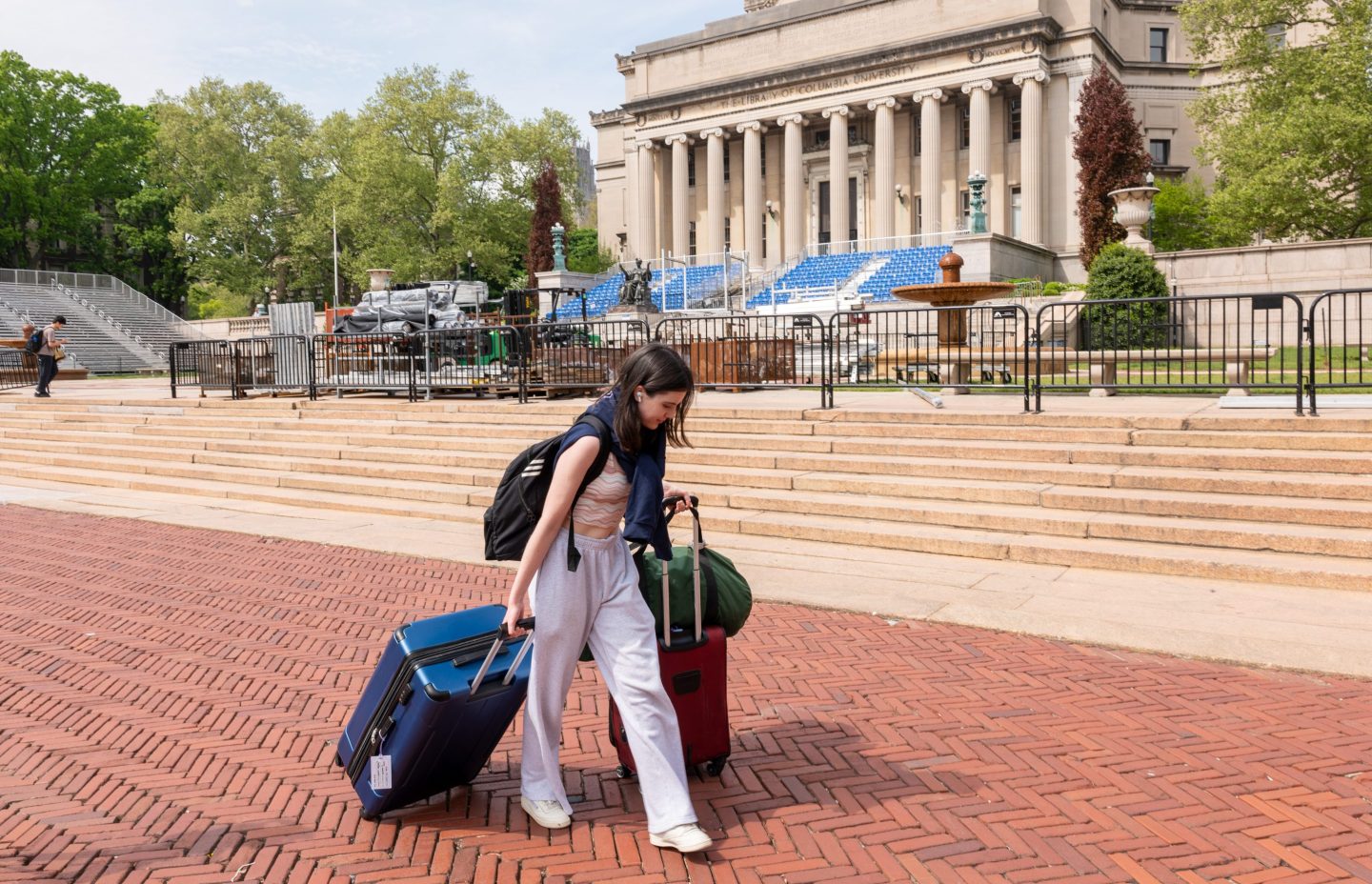 A Columbia University student walks through a nearly empty campus after police cleared out a Gaza protest encampment on May 06, 2024.