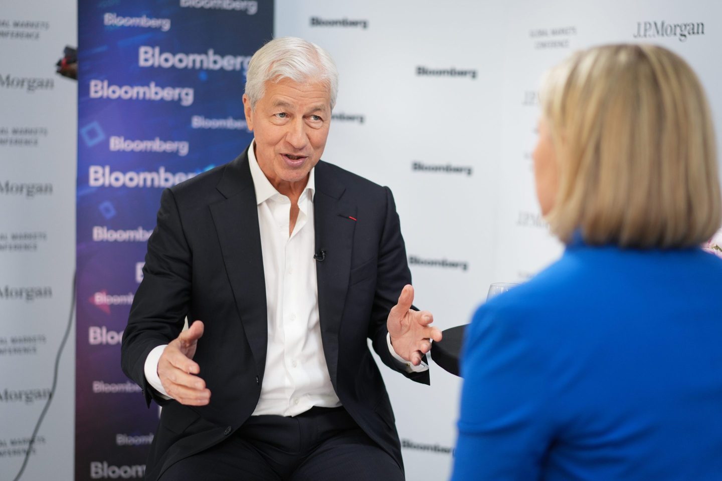 Jamie Dimon, chief executive officer of JPMorgan Chase &amp; Co., during a Bloomberg Television interview on the sidelines of the JPMorgan Global Markets Conference in Paris, France, on Thursday, May 16, 2024. Dimon said significant price pressures are still influencing the US economy and may mean interest rates will be higher for longer than many investors are expecting. Photographer: Nathan Laine/Bloomberg via Getty Images