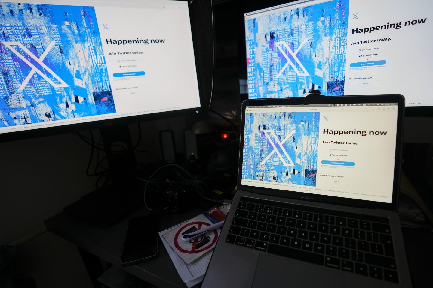 FILE &#8211; Computer monitors and a laptop display the X, formerly known as Twitter, sign-in page, July 24, 2023, in Belgrade, Serbia. Attorneys for X Corp. and a research organization that studies online hate speech traded arguments in court Thursday, Feb. 29, 2024, after the social media platform sued the non-profit Center for Countering Digital Hate for documenting the recent increase in hate speech on the site since it was purchased by Elon Musk. (AP Photo/Darko Vojinovic, File)
