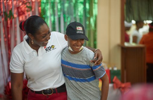Sherry Ferrell and one of the students from the New Amsterdam Special Needs School at EDO’s Children’s Treat last December
