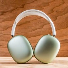 mint green apple airpods max headphones standing up