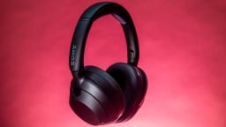 black Sony ULT wear headphones on a red background