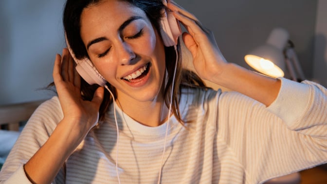 Women listening to AI song.
