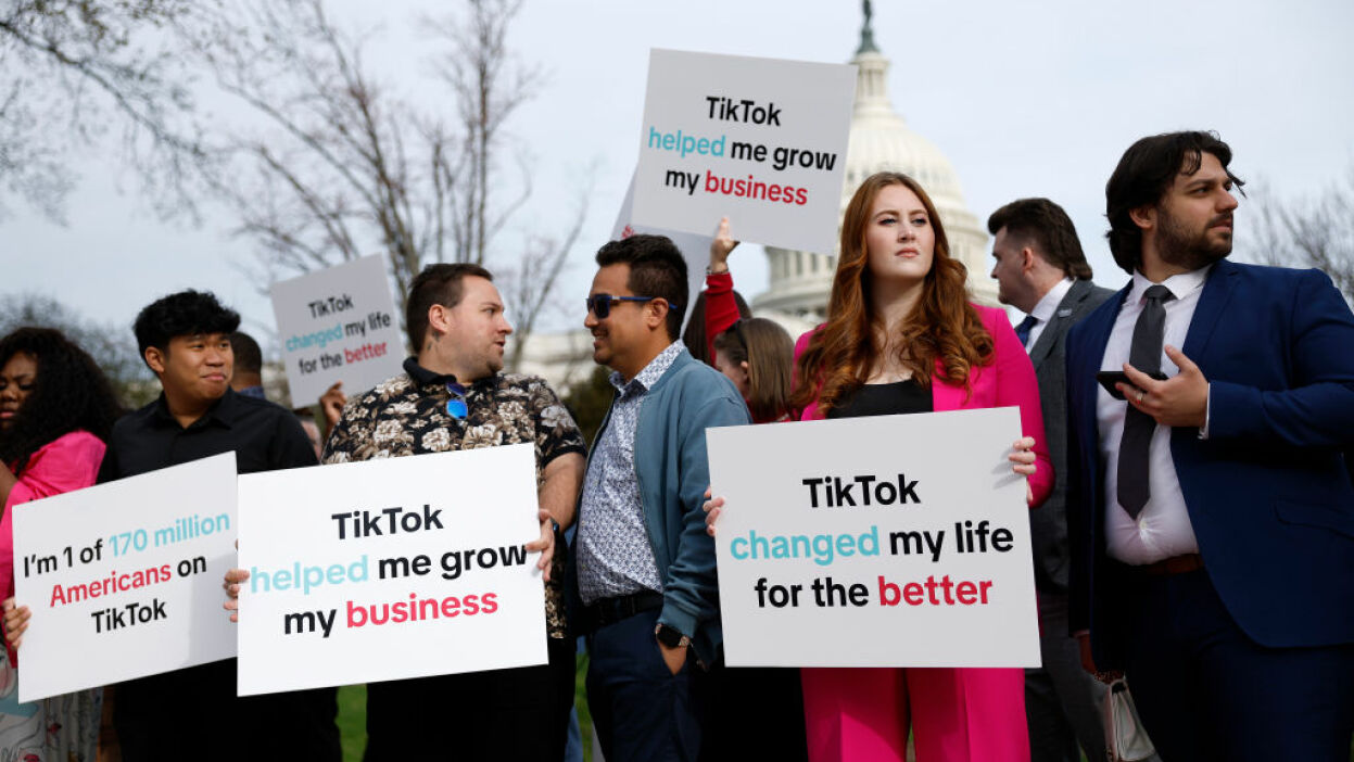 Participants hold signs in support of TikTok outside the U.S. Capitol Building on March 13, 2024 in Washington, DC.