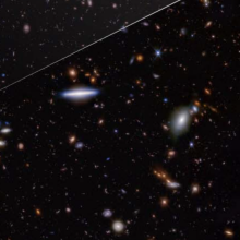 This deep field view from the James Webb Space Telescope shows (in the box) the oldest-known galaxy ever discovered.