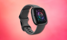 Fitbit sense 2 against a pink background 