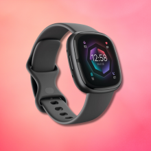 Fitbit sense 2 against a pink background 