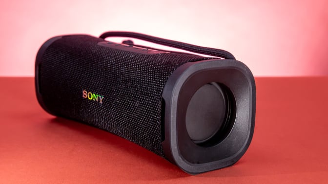 black rectangular sony speaker on red background