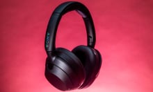 sony over-ear headphones against a pink background