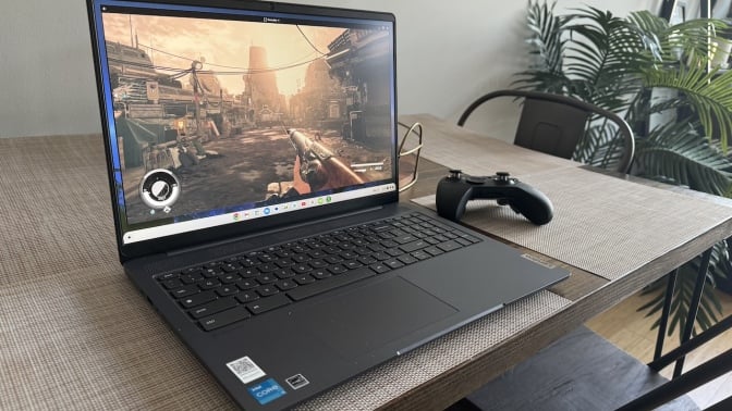 Lenovo Gaming Chromebook 16 sitting on a table with an Xbox controller