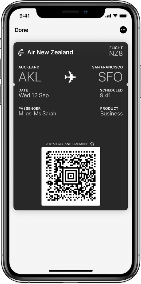 A boarding pass in Wallet showing flight information and the QR code at the bottom.