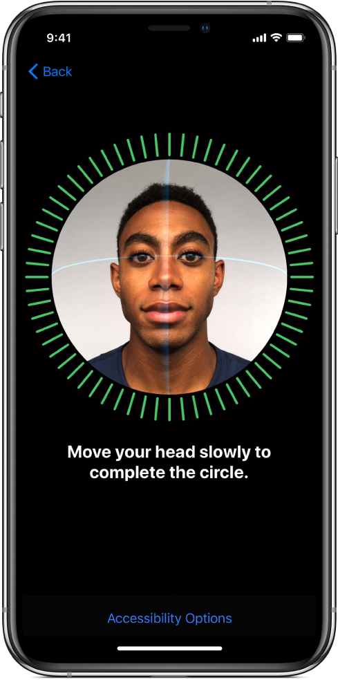 The Face ID recognition setup screen. A face is showing on the screen, enclosed in a circle. Text below that instructs you to move your head slowly to complete the circle.