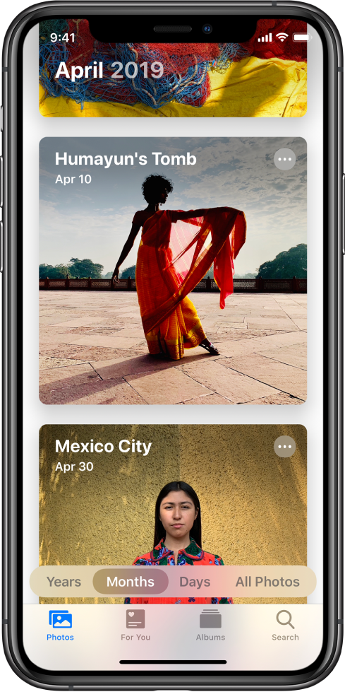 A screen in the Photos app. The Photos tab and Months view are selected. Two events from April 2019, Humayun’s Tomb and Mexico City, are displayed.