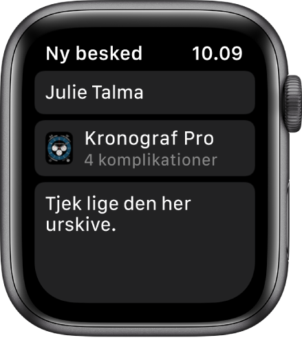 Apple Watch-skærmen, som viser en urskive, hvor der deles en besked med modtagerens navn foroven, navnet på urskiven nedenunder og under det en besked med ordlyden “Tjek lige den her urskive.”.
