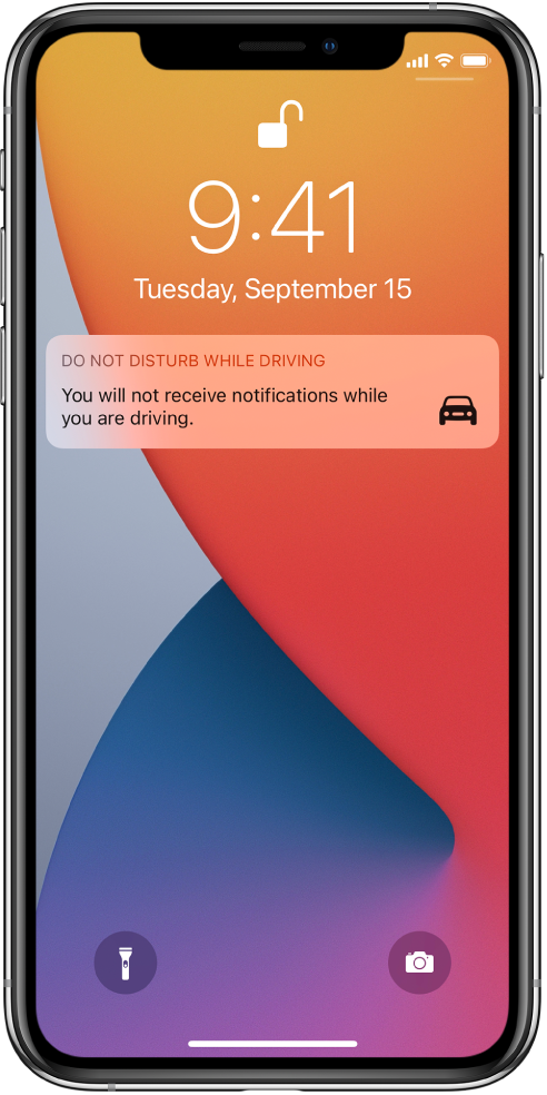The Do Not Disturb While Driving notification on the Lock Screen.