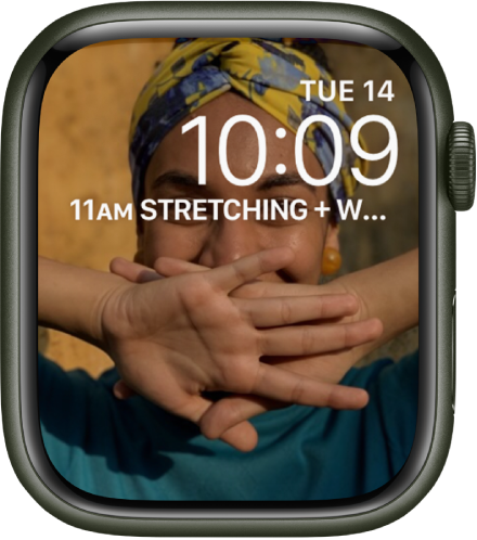 The Photos watch face shows a photo from your synced photo album. The date and time is near the top right, and a Calendar Schedule complication is below.